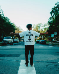 “Hebrews 2:9” Tee