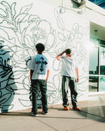 “Hebrews 2:9” Tee