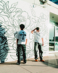 “Hebrews 2:9” Tee